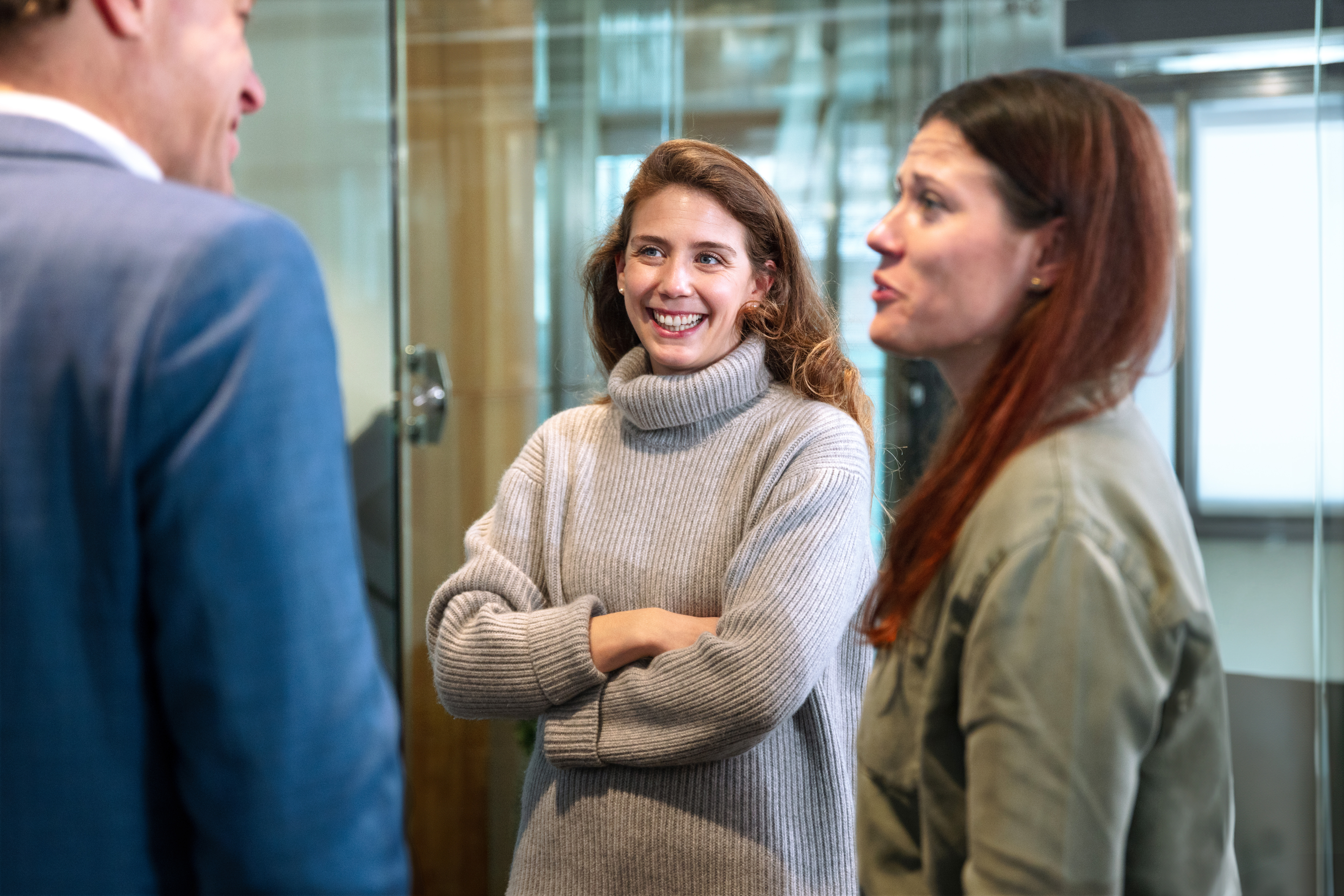 A group of people chatting.