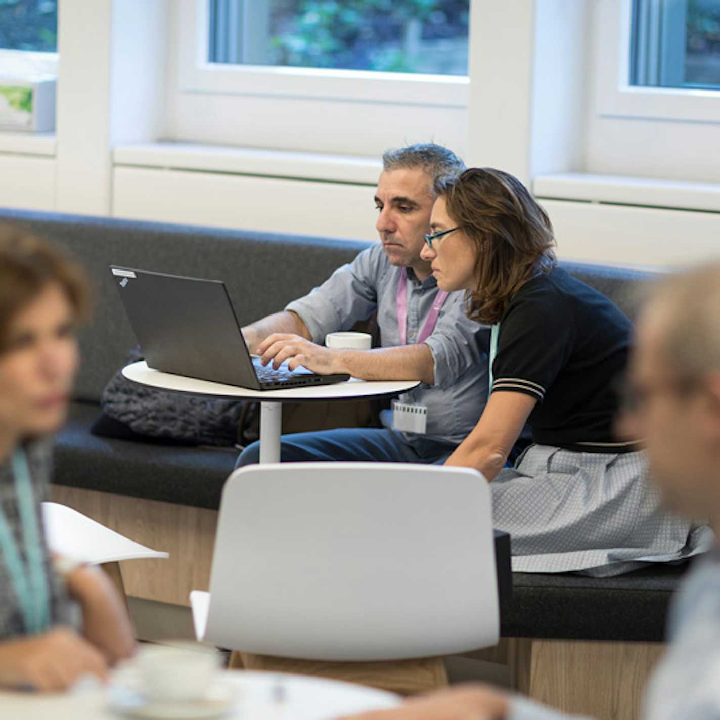 People looking at a computer screen