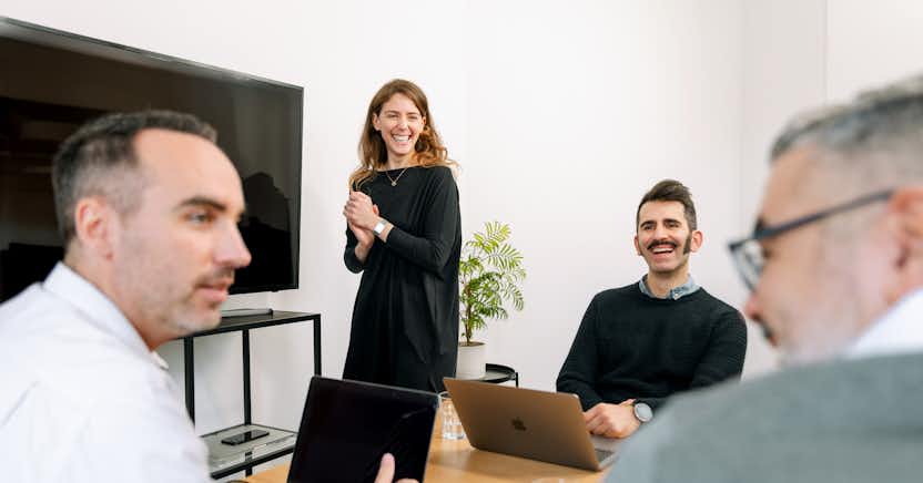 four people in an office setting
