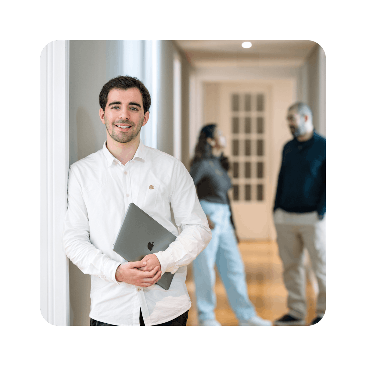 Man holding laptop computer