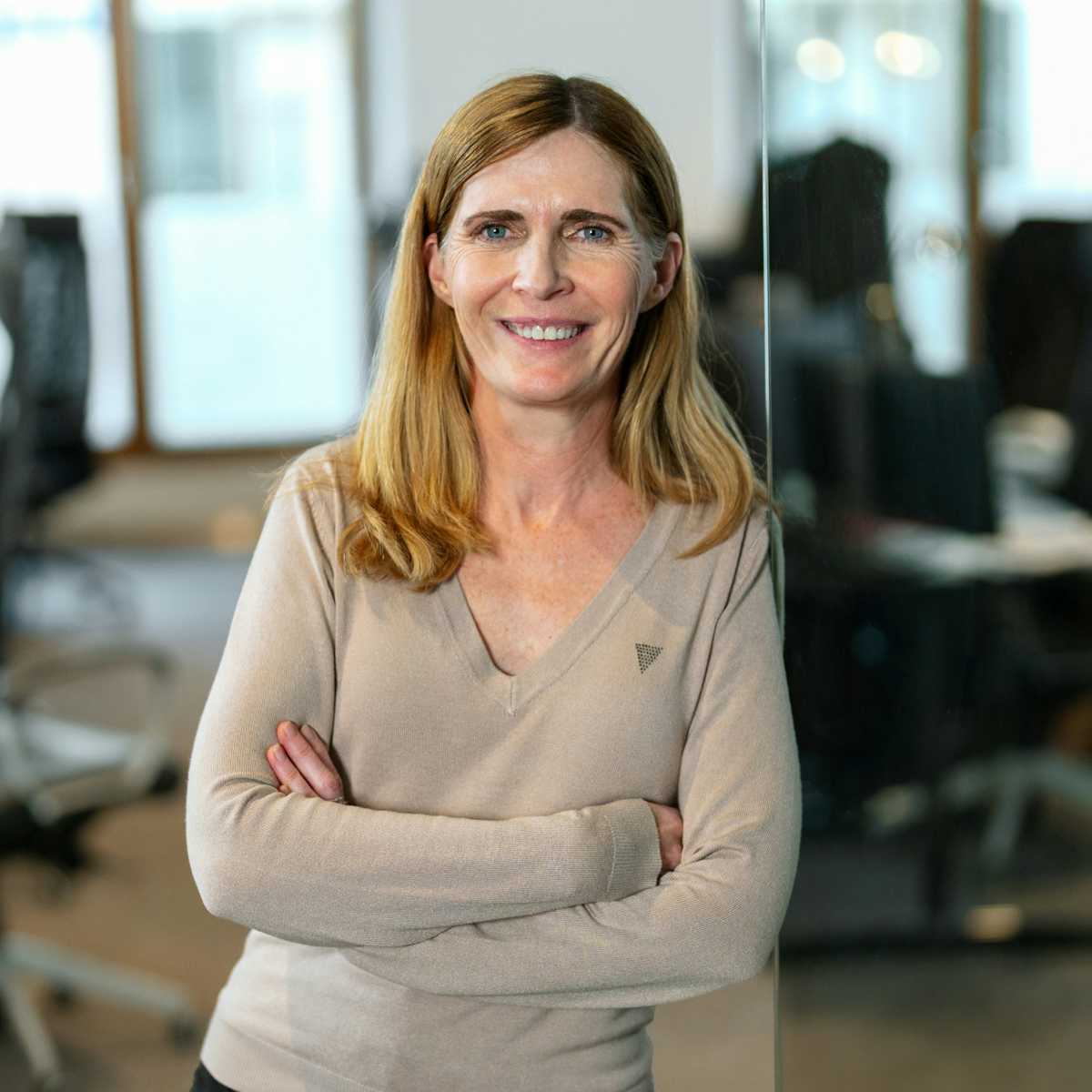 A woman looking into the camera.