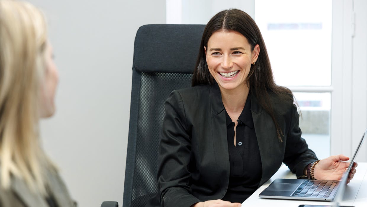 Two women in an office.