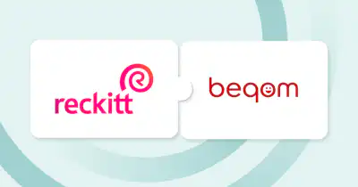 Reckitt and beqom logos connected like puzzle pieces