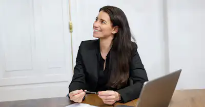 woman smiling in work setting