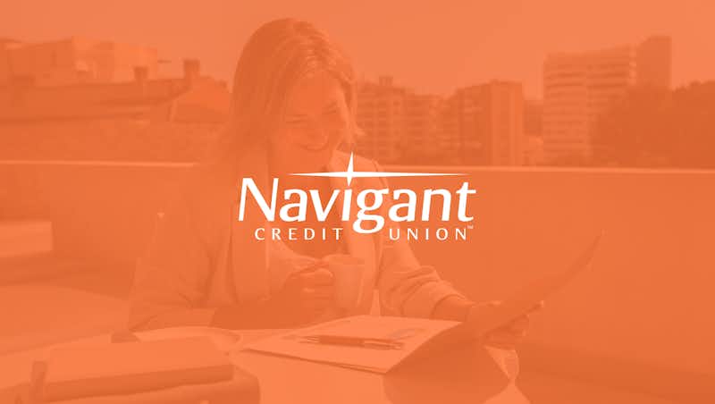 Image with an orange filter and the Navigant logo in the center.