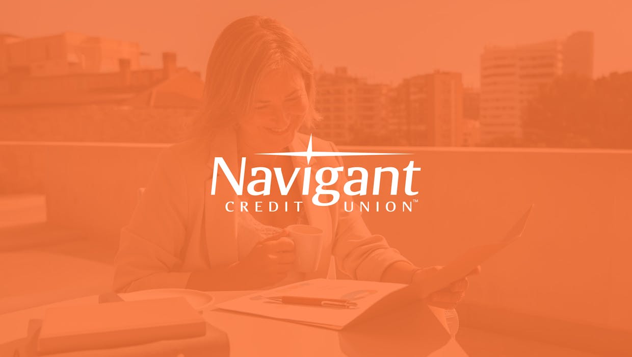 Image with an orange filter and the Navigant logo in the center.