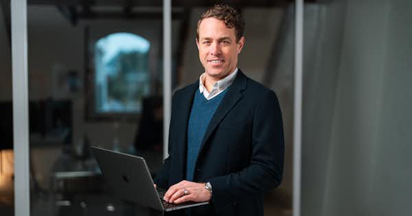 Man standing wearing blazer