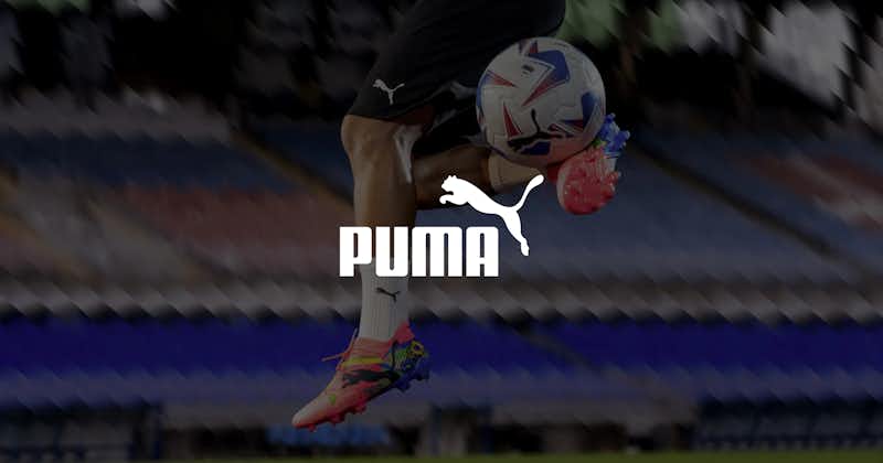 Puma football boots and shorts with Puma logo