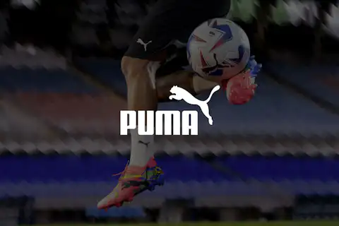 Puma football boots and shorts with Puma logo