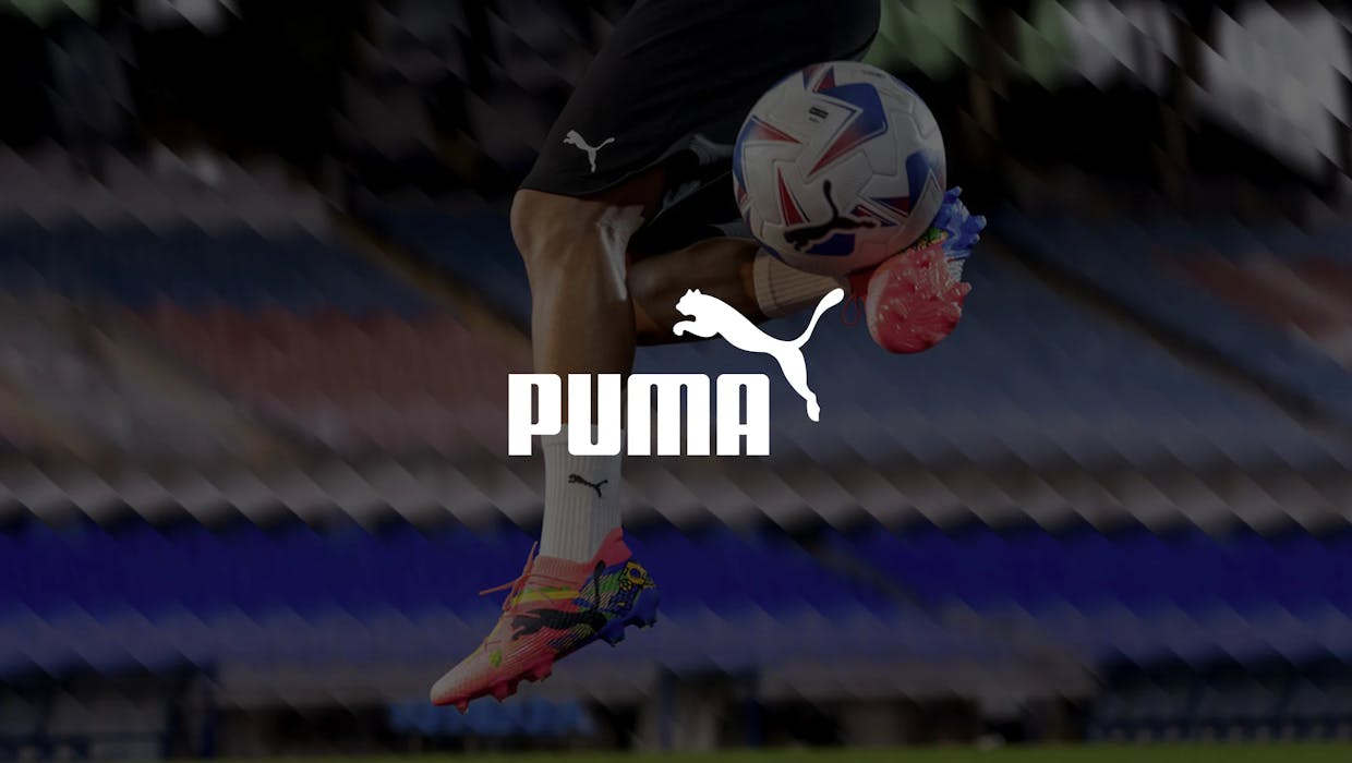 Puma football boots and shorts with Puma logo