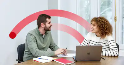 image of two working colleagues smiling