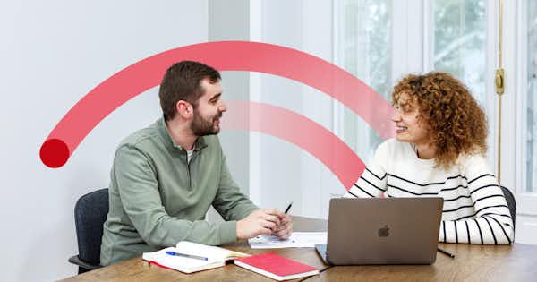 image of two working colleagues smiling