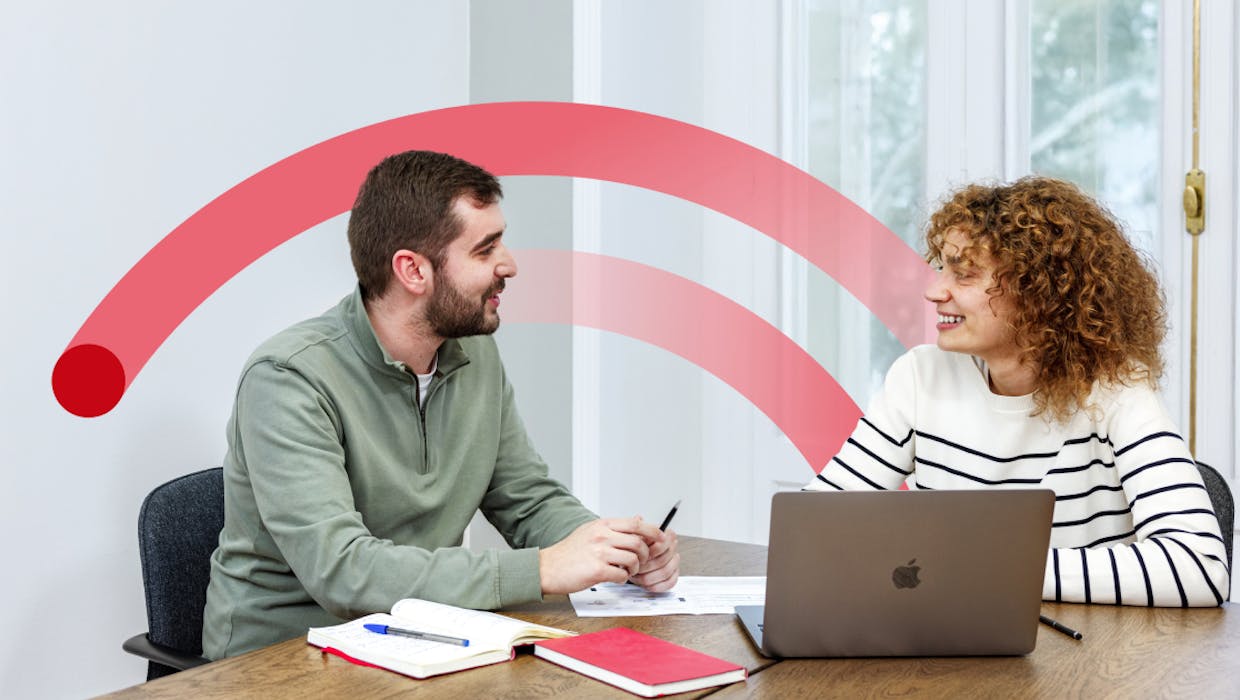 image of two working colleagues smiling