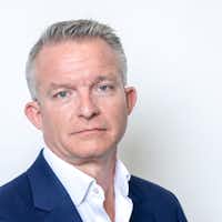 A photograph of Simon Church