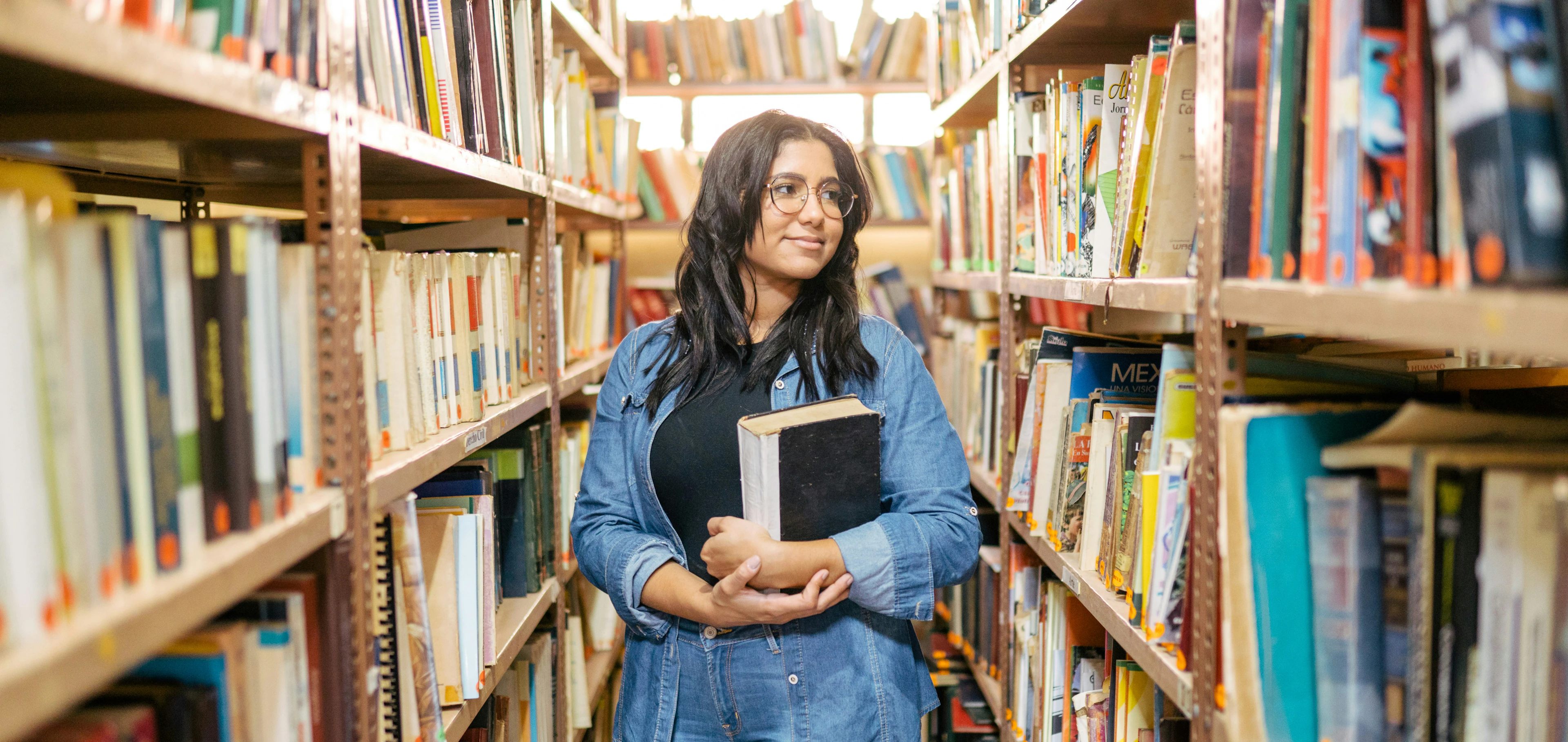 Student holding book