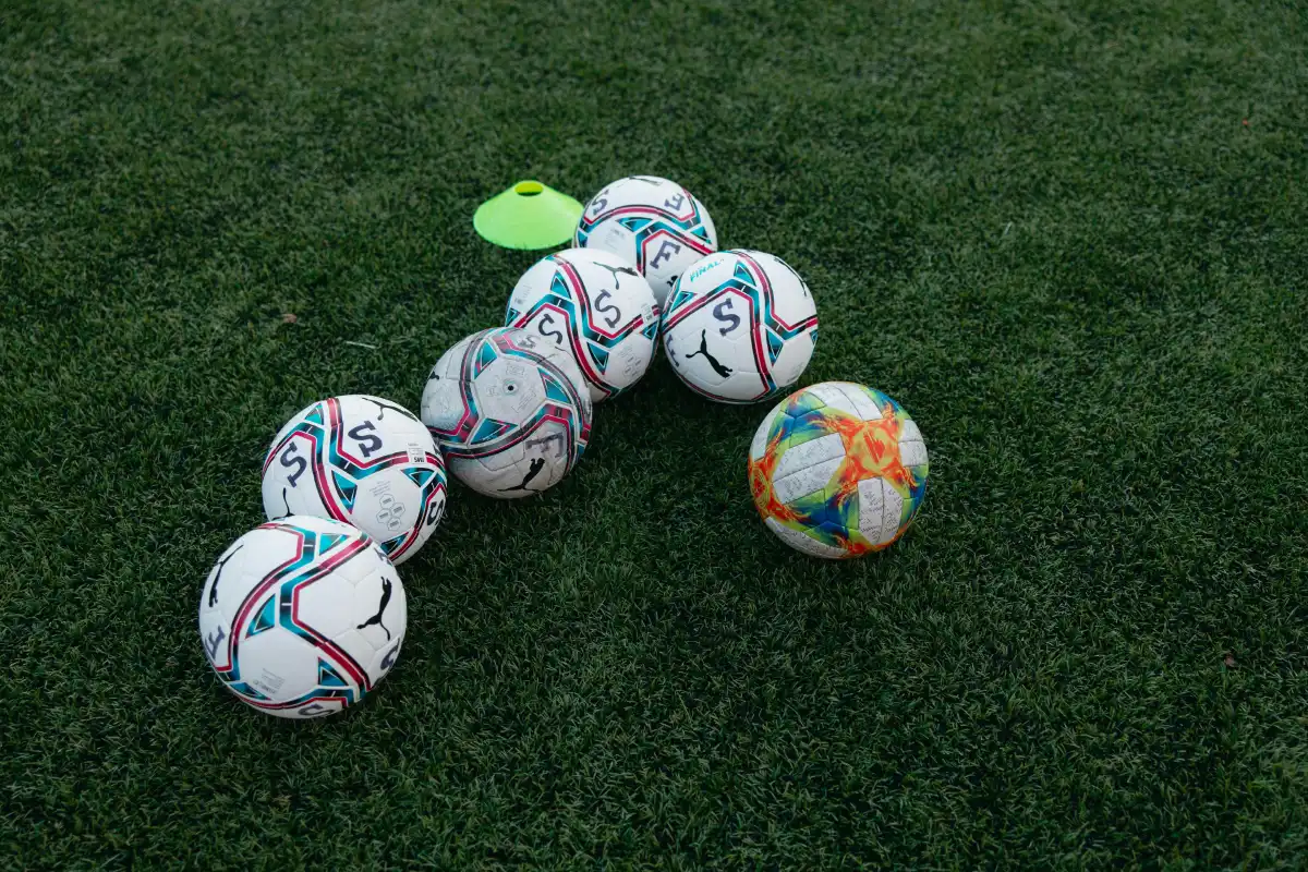 Footballs on a Pitch
