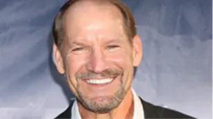 Headshot of Bill Cowher smiling