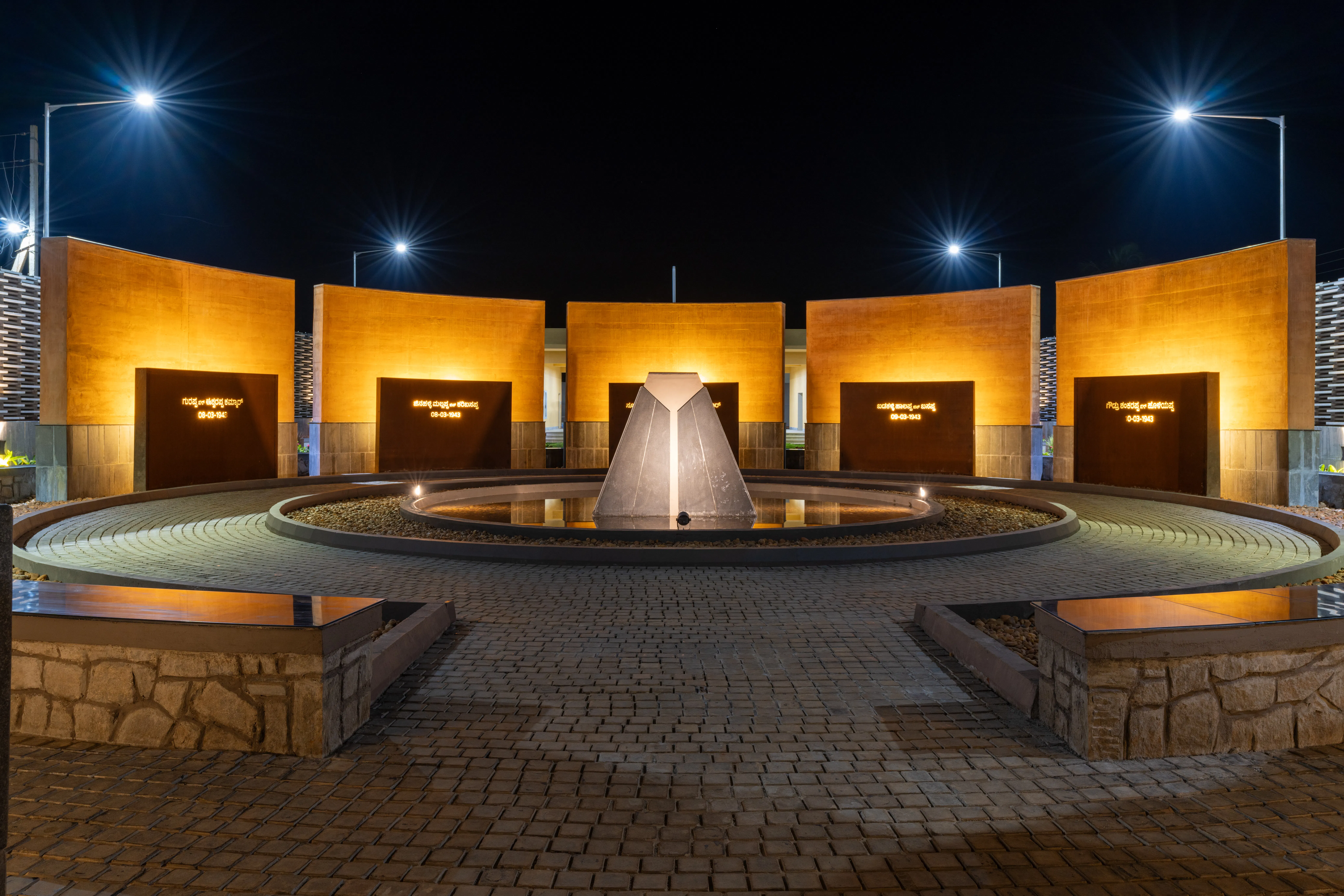 BACKLIT MARTYRS WALL AND SMARAKA DURING NIGHT