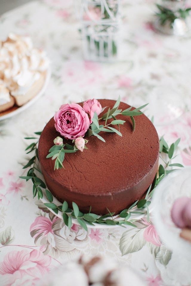 Delicious chocolate cake with flower decoration