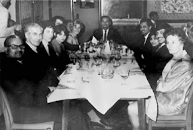 Milapchand Dadha (and family) with Colonel Carter (and family),MD of Ward Blerkinsop Ltd, at a dinner outing in Liverpool, England