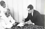 S. Lalchand Dadha with Mr. E.B.Ward, Chairman, Ward Blerkinsop Ltd, at the signing of transfer of business to Dadha & Co (grandson Maher is in the background)