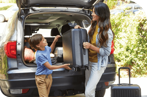 family unpacking car