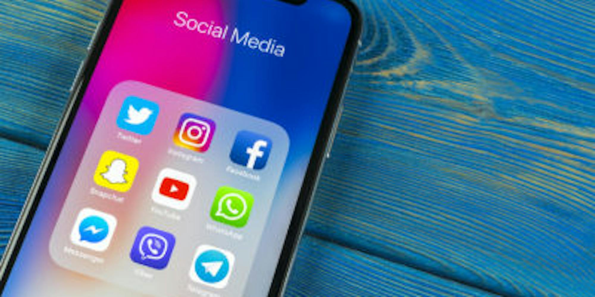 A phone showing social media platforms