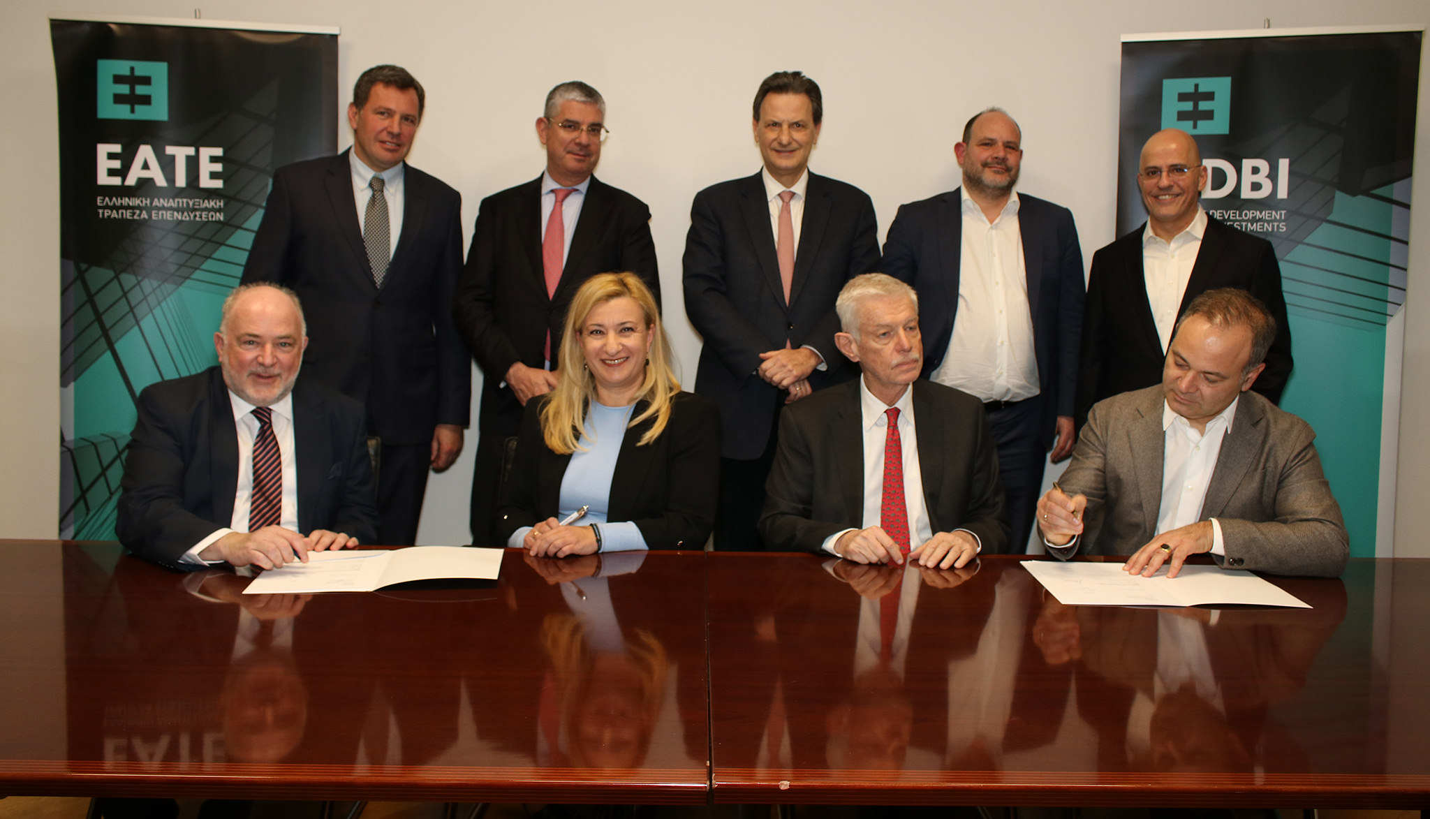 Photo of HDBI & Big Pi partners signing the deal