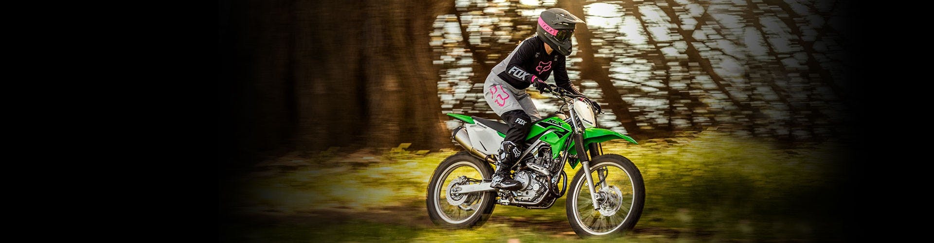 Kawasaki KLX230R S in lime green colour off track