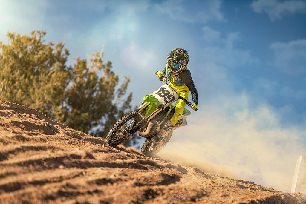 KAWASAKI KX85 in action on off-road track