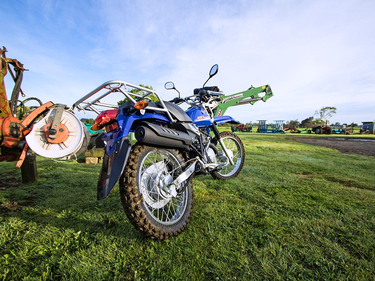 Yamaha AG125 motorcycle on a farm