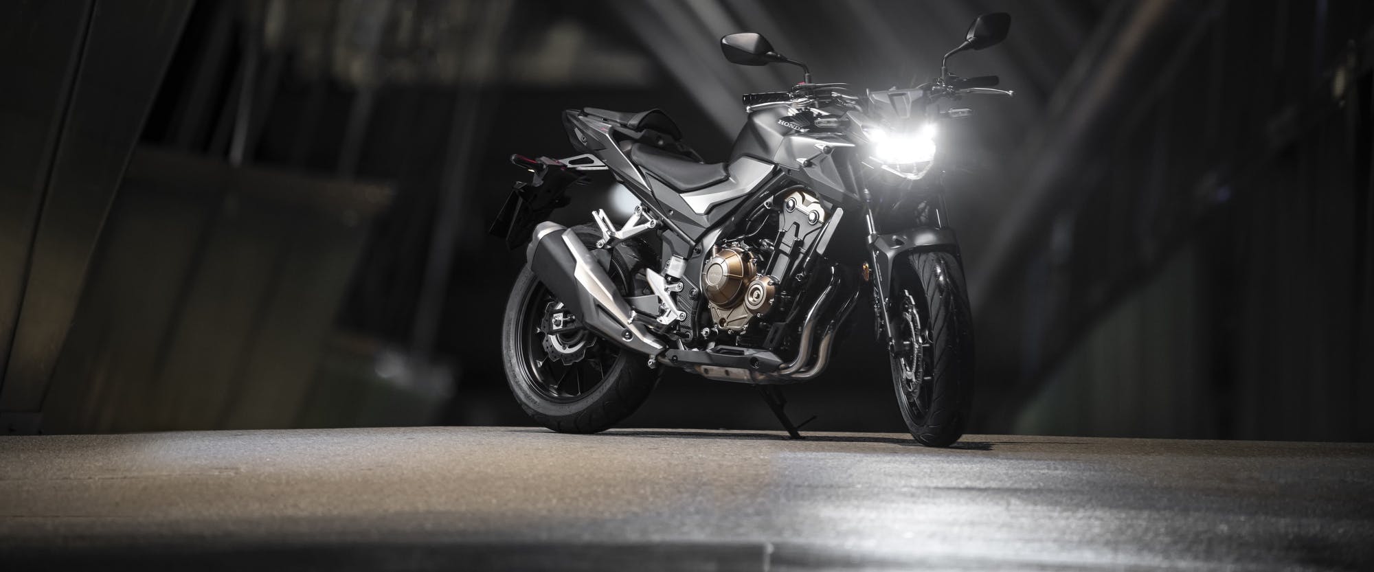 Honda CB500F in matte gunpowder black metallic colour, parked