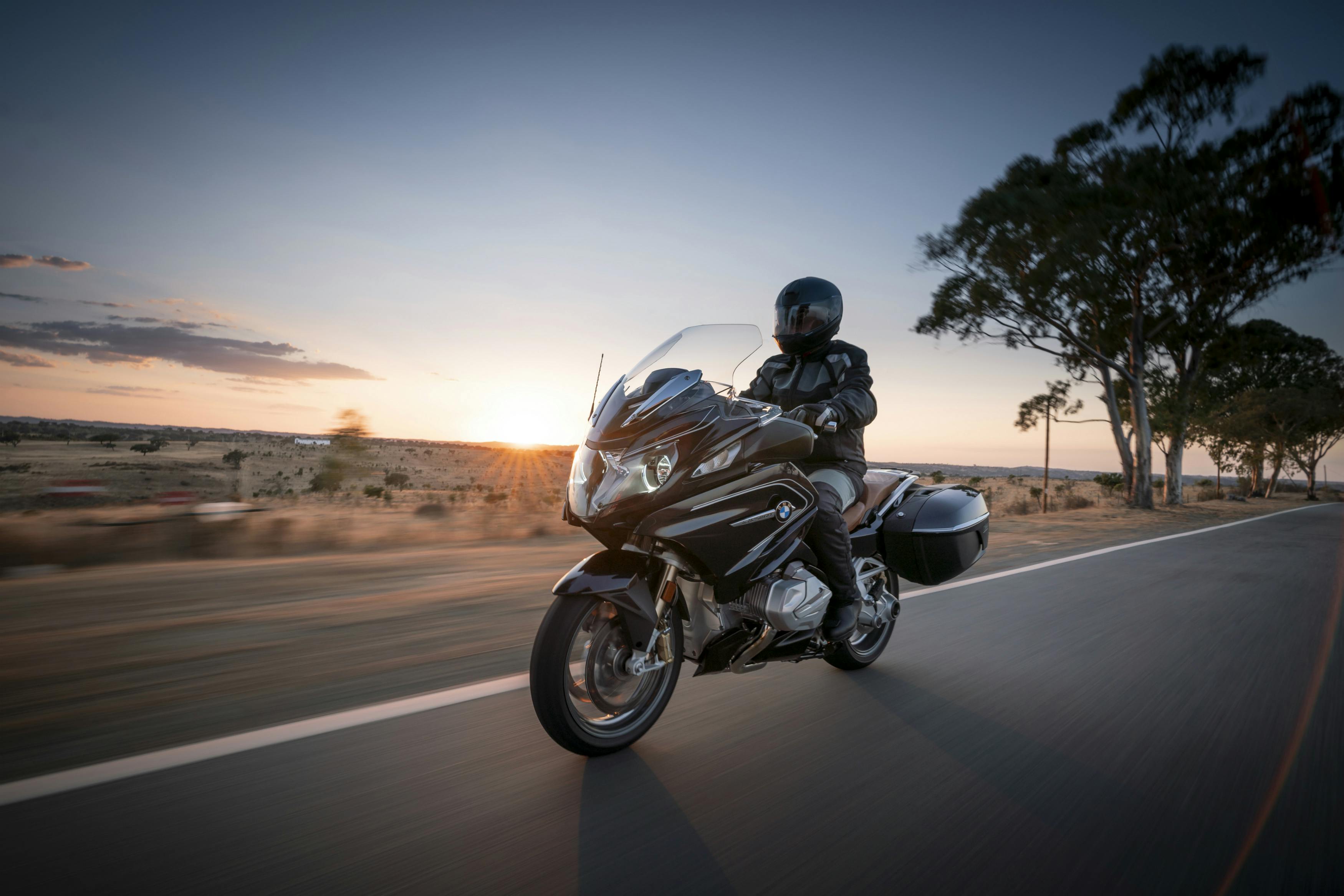 BMW R 1250 RT (SPORT) being ridden on the hill road