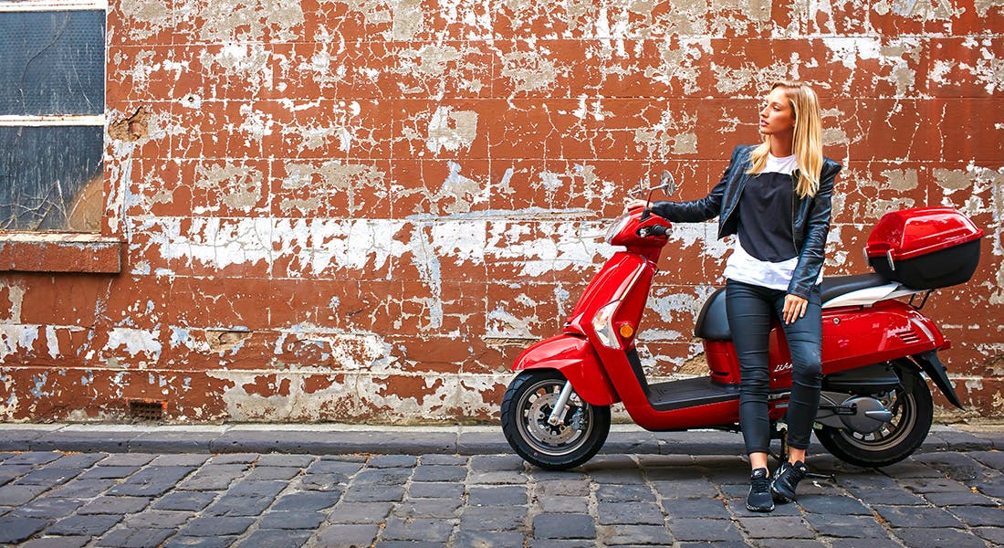 KYMCO LIKE 125 in red colour, parked