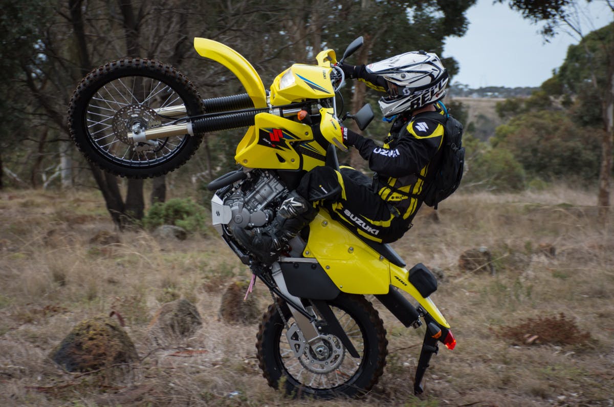 SUZUKI DR-Z400E being ridden off road