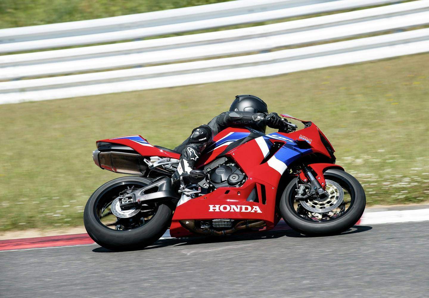 Honda CBR600RR in Grand Prix Red colour on race track