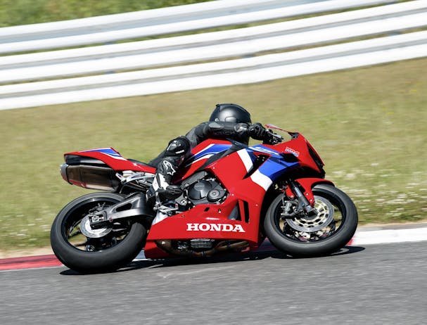 Honda CBR600RR in Grand Prix Red colour on race track