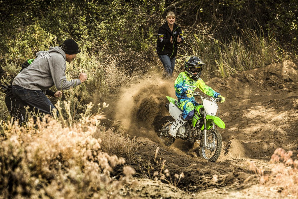 Kawasaki KLX110R in Lime Green colour on track