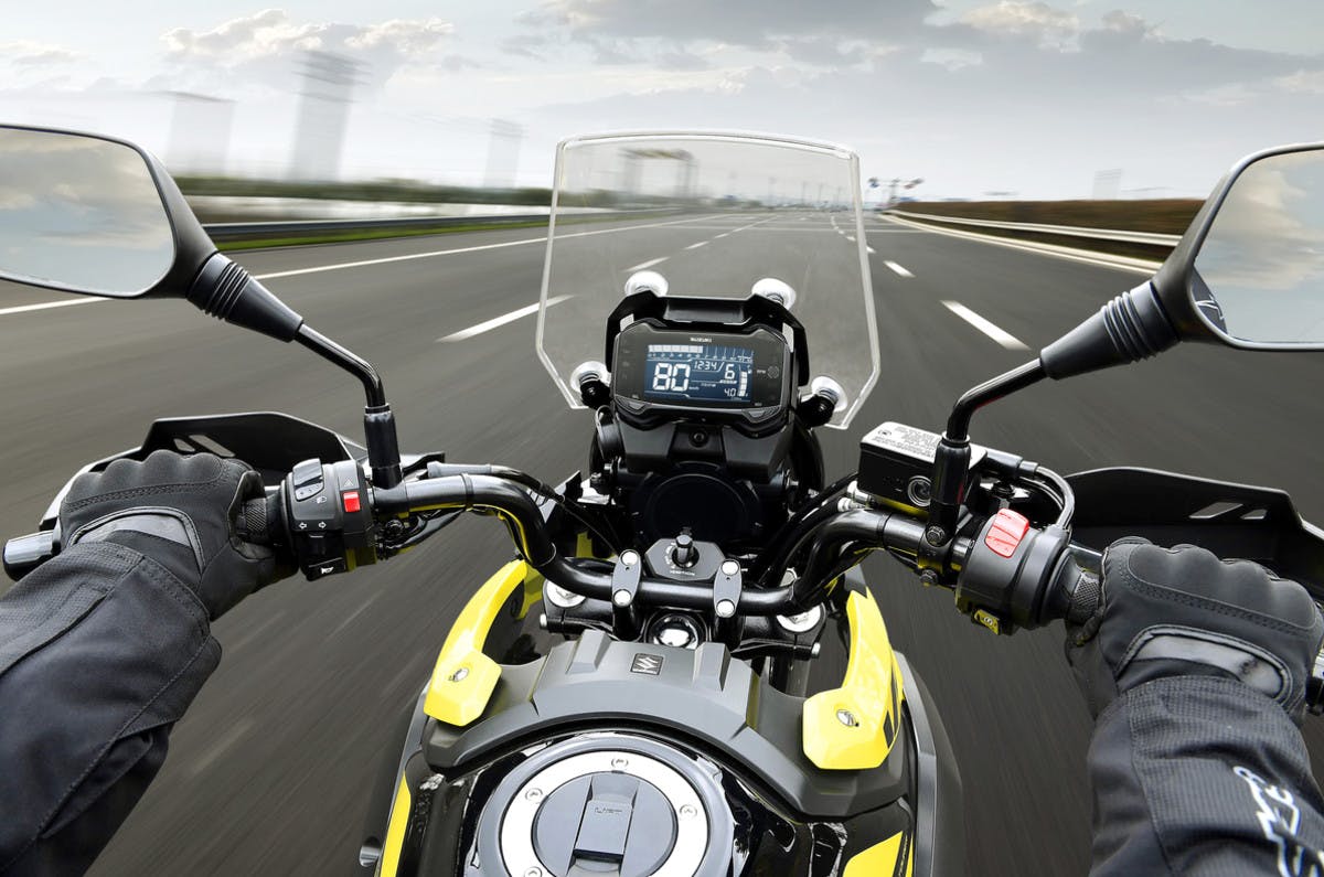 SUZUKI V-STROM 250 being ridden on a road
