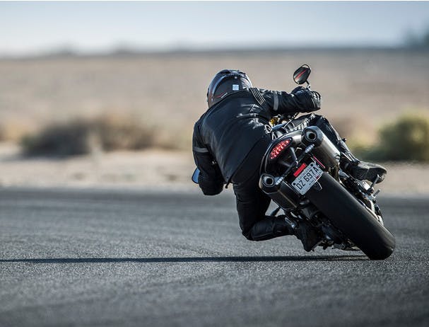TRIUMPH SPEED TRIPLE S being ridden on the hill road