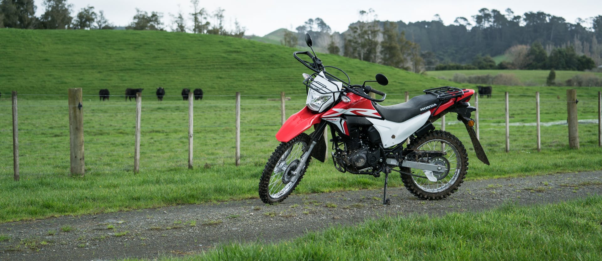 Honda XR190CT AG-XR in fighting red colour parked on the farm road