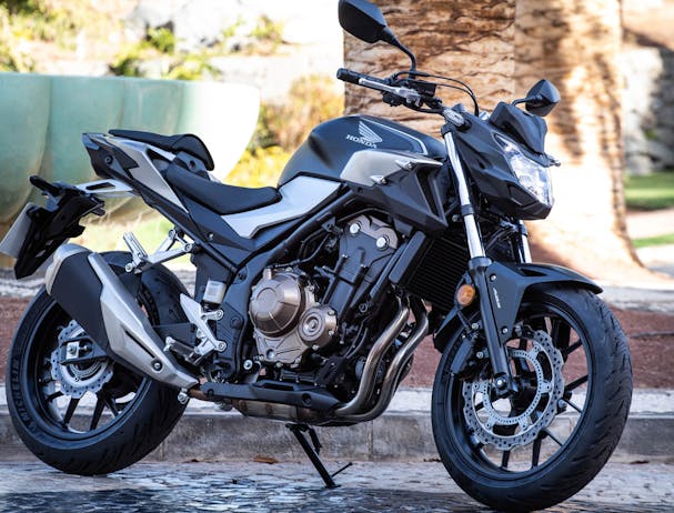 Honda CB500F in matte gunpowder black metallic colour, parked