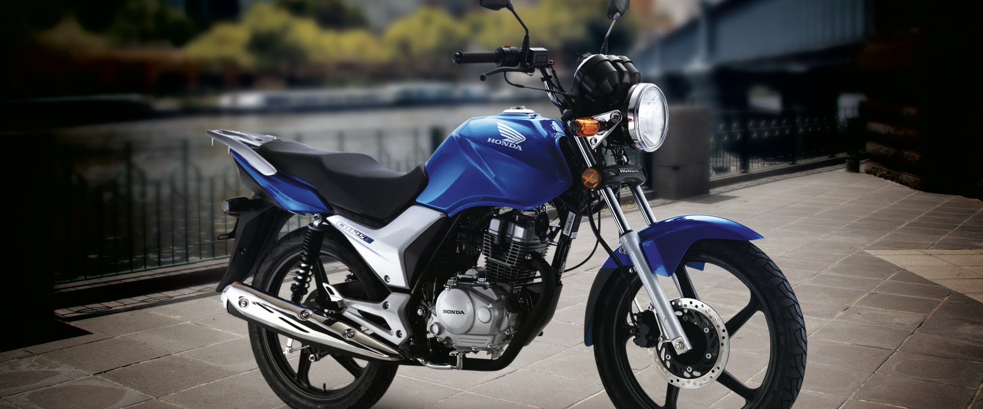 Honda CB125E in glint wave blue metallic colour, parked