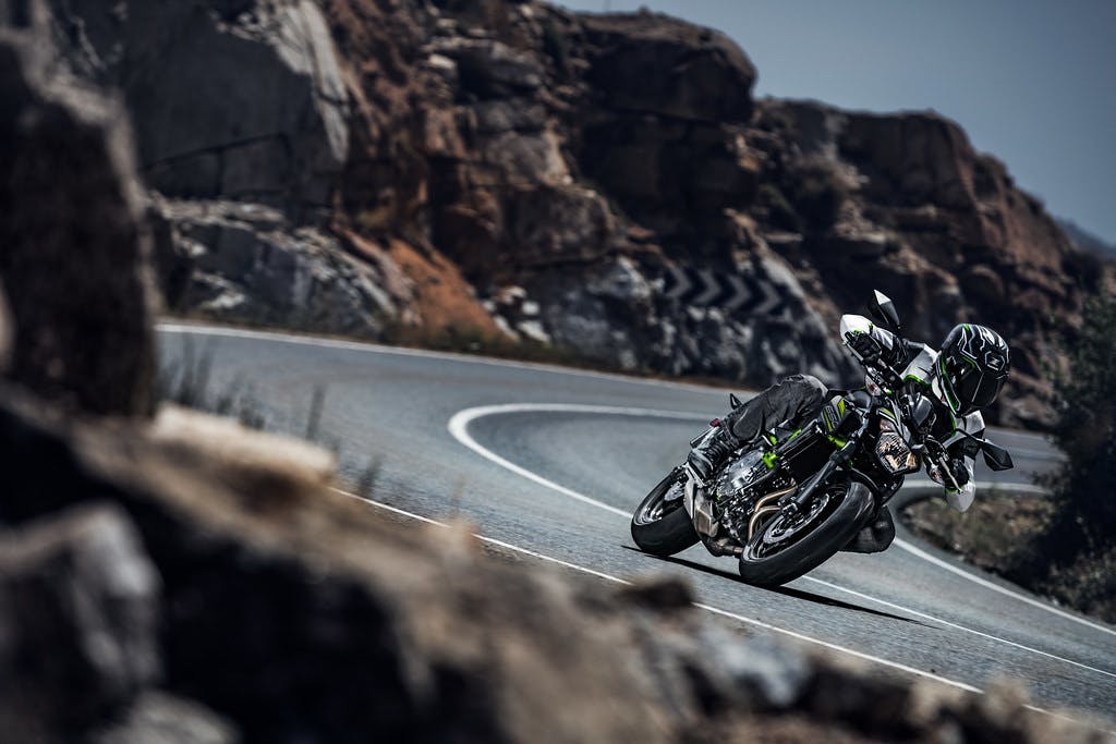 Kawasaki Z650L being ridden on a road
