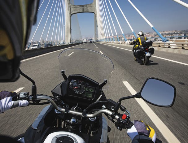 SUZUKI V-STROM 650 ABS being ridden on a road