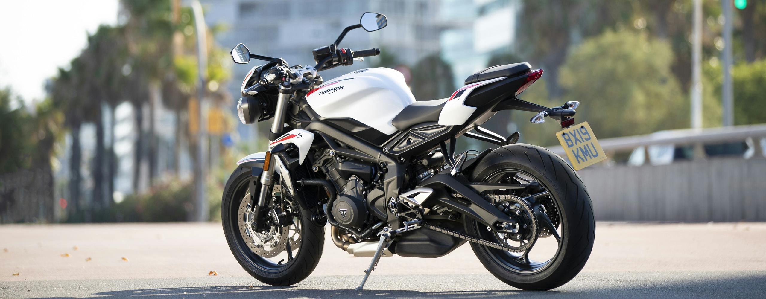 Triumph Street Triple S in crystal white colour, parked