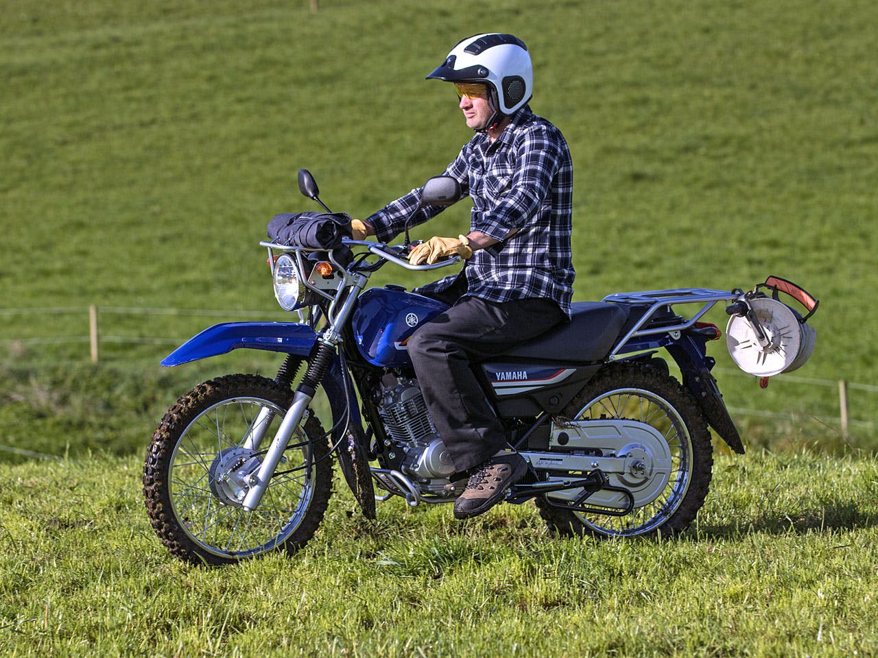 Yamaha AG125 motorcycle on a farm