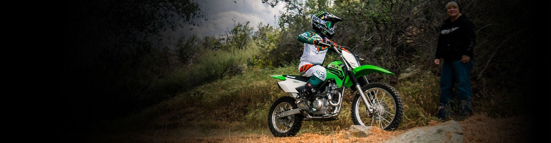 Kawasaki KLX140R in Lime Green colour on off road track
