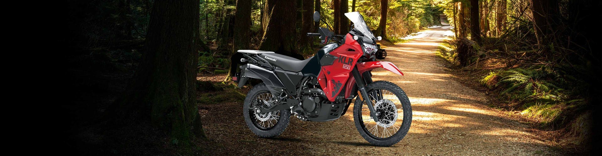 Kawasaki KLR650 in red and gray colour on off road track