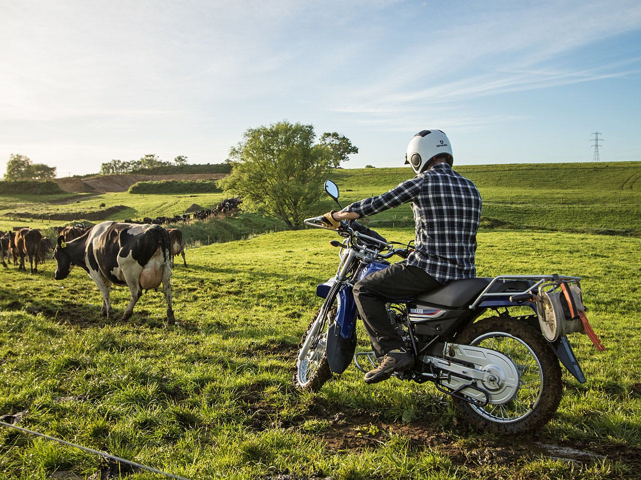 Yamaha AG125 motorcycle on a farm